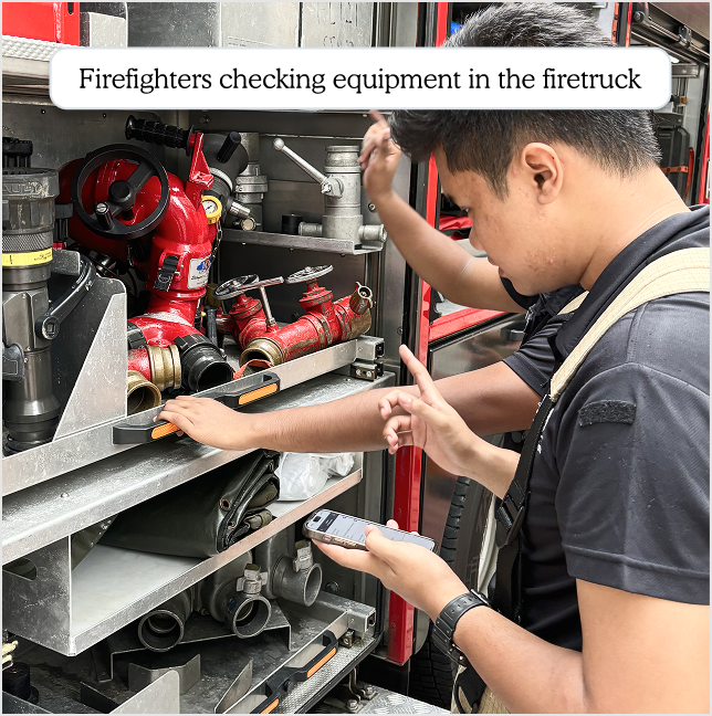 Firefighters checking equipment in the firetruck